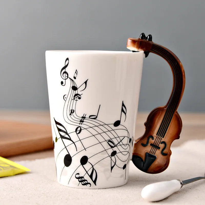 Taza de cerámica de 240 ml con asa en forma de instrumento musical, para café, té o leche, en diseños de guitarra, violín, piano o nota musical