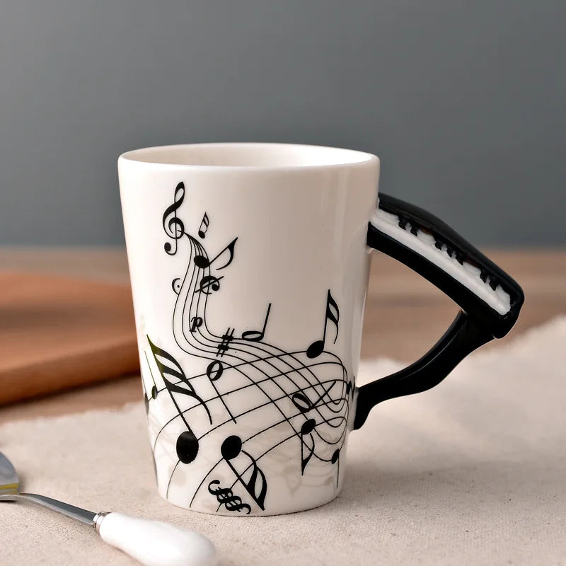 Taza de cerámica de 240 ml con asa en forma de instrumento musical, para café, té o leche, en diseños de guitarra, violín, piano o nota musical
