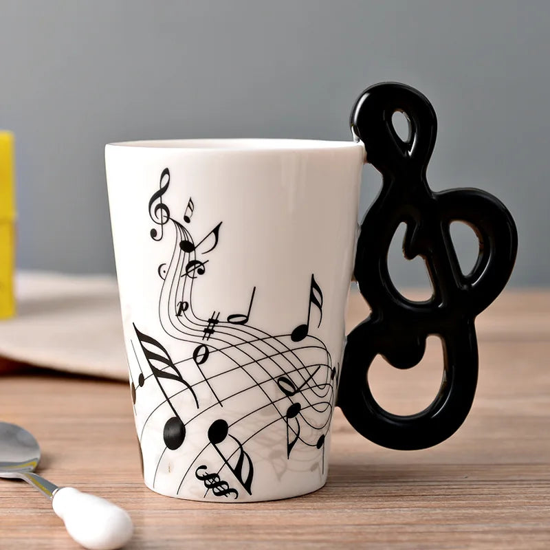 Taza de cerámica de 240 ml con asa en forma de instrumento musical, para café, té o leche, en diseños de guitarra, violín, piano o nota musical